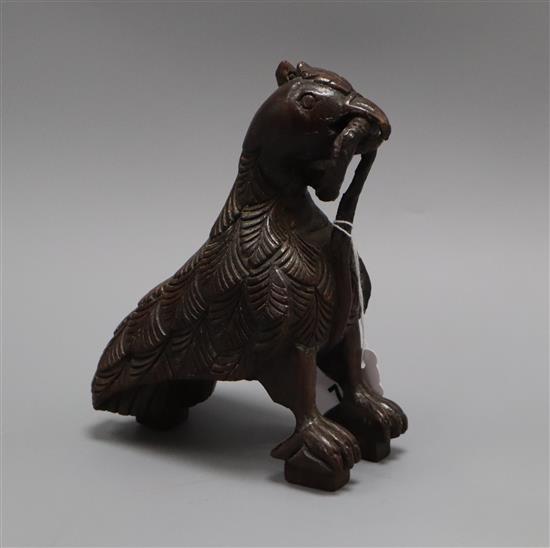 A 19th century Indian hardwood figure of a mythical bird height 19.5cm